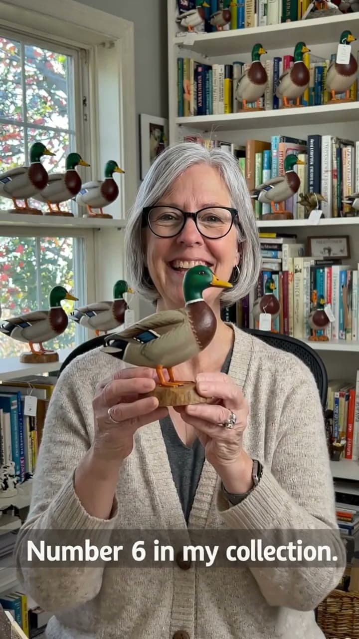 Long-time collector holding her duck